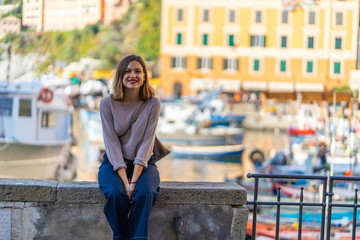 happy beautiful brunette girl smiling in Camogli, Genova, Liguria, Italy