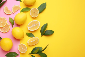 Ripe lemons on color background
