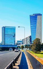 Street with Glass Business office building architecture of Modern City