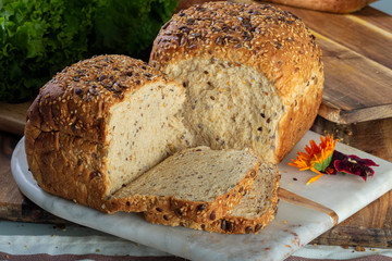Whole Wheat Quinoa Bread on wooden table