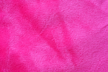 Fototapeta premium texture of pink decorative fur, fabric background