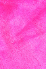texture of pink decorative fur, fabric background