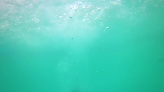 Underwater cannon ball with water bubbles