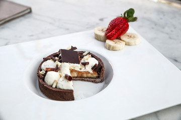 chocolate cake with ice cream and strawberries
