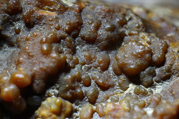 Spherulite peel of chalcedony on flint stone