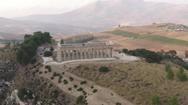 Aerial view of temple of Olympian is also known as the Columns of the Olympian Zeus. Action. Ancient temple standing on the high hill in Athens in Greece.