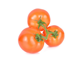 bunch of whole fresh tomatoes with stem on white background