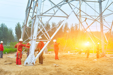 Fototapeta premium Pylon construction workers