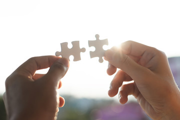 Connect jigsaw pieces to create network connection silhouette sunset, Business concept.