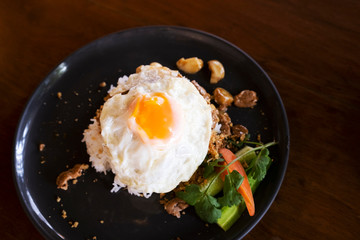 Pork fried rice with garlic, pepper and fried egg