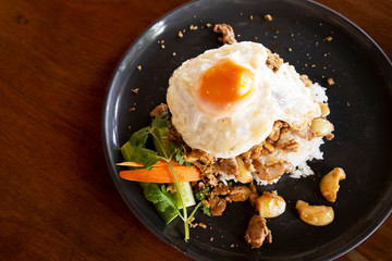 Pork fried rice with garlic, pepper and fried egg