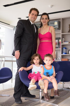 Portrait Of Iranian Family Relaxing Together At Home