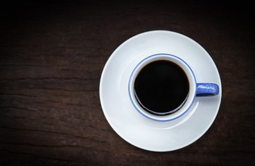 Obraz na płótnie Canvas Blue cup of black coffee for healthy drinking 