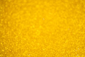 Abstract blur gold glitter bokeh background