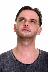 Obraz premium Face of man thinking and looking up