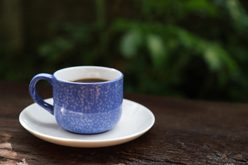 Blue cup of black coffee for healthy drinking 