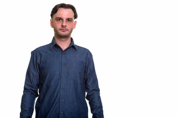 Fototapeta premium Portrait of businessman with casual shirt looking at camera