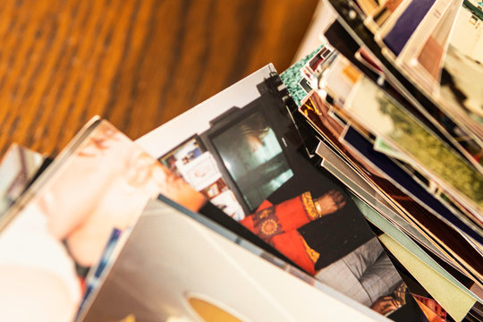 Stack Of Old Photo Prints And Memories To Be Digitized A