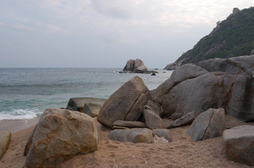 Lots of rocks in the sea of Ao Tanot (Tanote Bay) in Koh Tao, Thailand