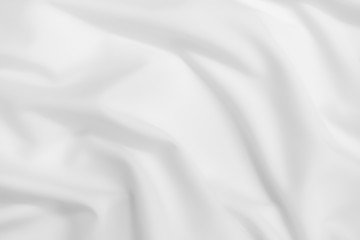 Fototapeta premium Abstract white fabric texture background. Cloth soft wave. Creases of satin, silk, and cotton.
