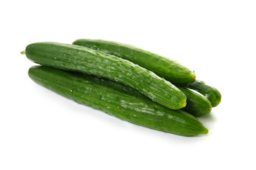 green long cucumbers on a white background