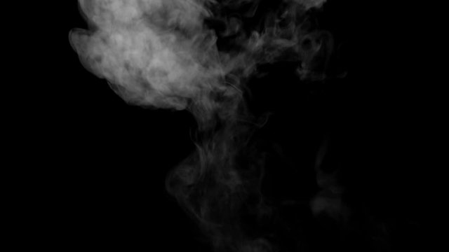 The smoke motion isolated on black background ,slow motion movement