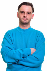 Obraz premium Studio shot of young man with arms crossed