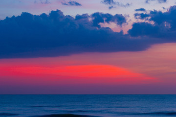 landscape view the beautiful silhouette last little bit of the sunrise light shoots of the sea