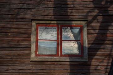 Winow in a logg house wall from 1800s