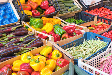 Bell peppers and other vegetables for sale at a market in Naples, Italy