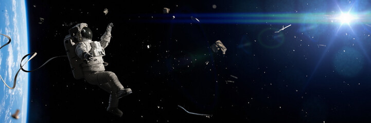 astronaut hit by space debris storm in orbit of planet Earth © dottedyeti