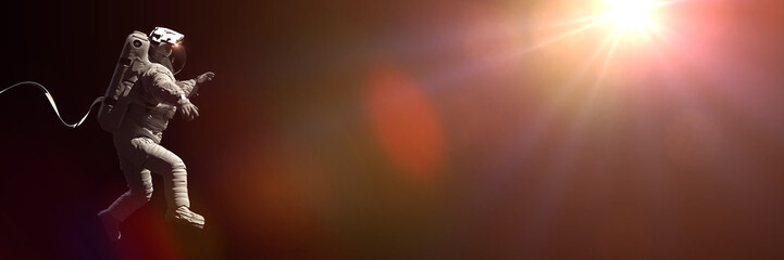 spacewalking astronaut lit by the Sun © dottedyeti
