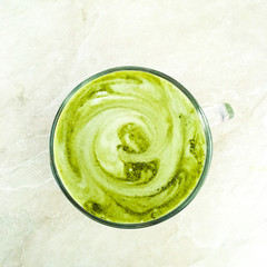 A cup of green match tea. Chinese green tea.