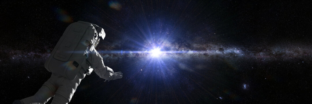 Astronaut In Outer Space Flying Towards The Center Of The Milky Way Galaxy 