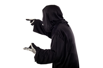 The grim reaper or death halloween costume isolated on a white background.  The skeleton is wearing...