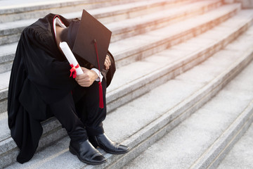 Graduates is sitting stressed, unemployed, economic crisis