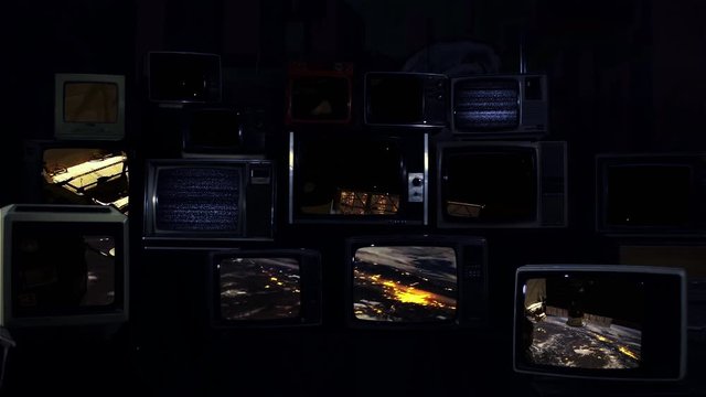  Planet Earth from the International Space Station on Retro TVs. Blue Dark Tone. Elements of this video furnished by NASA.