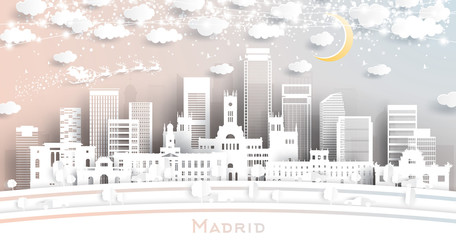 Madrid Spain City Skyline in Paper Cut Style with Snowflakes, Moon and Neon Garland.