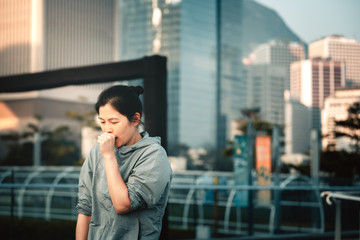 Fototapeta premium Woman feel sick in city
