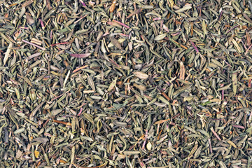 Dried thyme leaves background close up. Background of thyme. Organic herbs. Thyme plant close-up