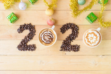 Hot cappuccino with coffee bean in 2020 year sign / Happy New year 2020