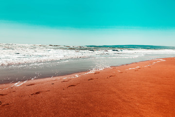 Beautiful blue turquoise sea with waves. Summertime. Sunny. Beach. Sand