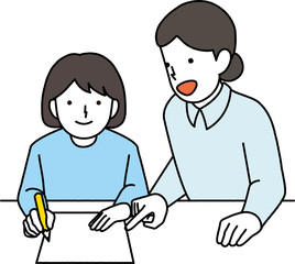 先生に勉強を教えてもらう女の子