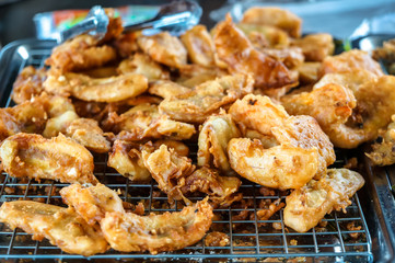 close up the famous thai snack fry banana, Use fried oil until gold then sprinkled with sesame.