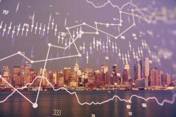 Financial graph on night city scape with tall buildings background double exposure. Analysis concept.