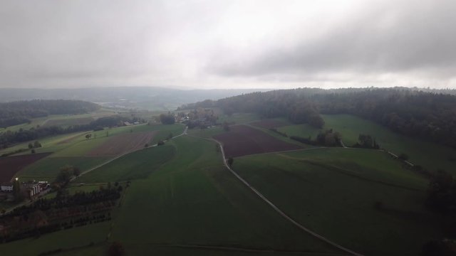Aerial over the region of Regensberg in Zurich, Switzerland. Drone slow forward dolly