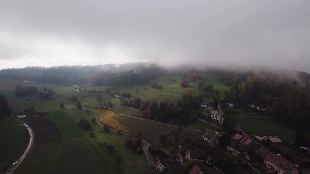 Aerial over the region of Regensberg in Zurich, Switzerland. Drone slow forward dolly