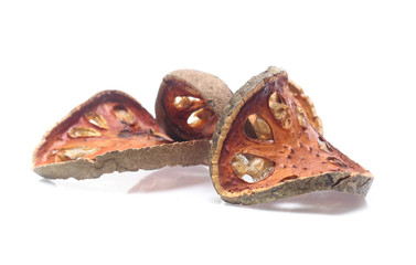 Fototapeta premium Dry bael fruit on white background