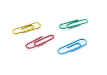 color paperclips on a white background