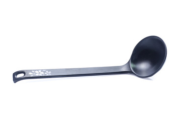 plastic black spoon, isolated on white background